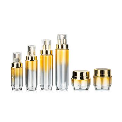 Luxury Gradient Gold Cosmetic Bottle Set Empty Lotion Pump Bottles Face Cream Jars Skincare Packaging Containers Custom Logo